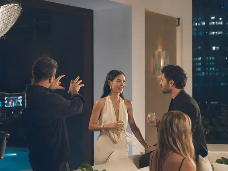 Creative director shaping a scene with talent during a Mind Miami shoot day