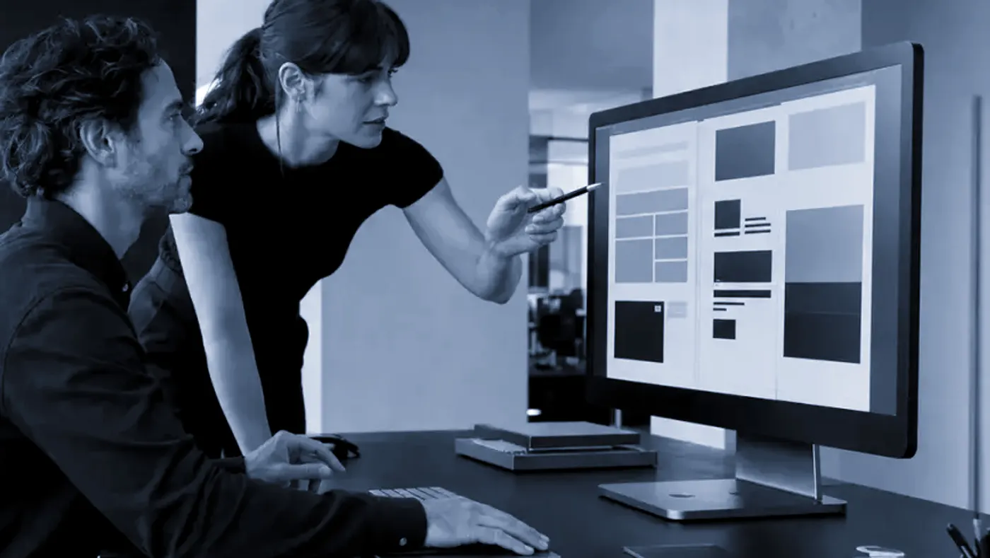 Mind Miami designer and developer building a client system on screen, side by side